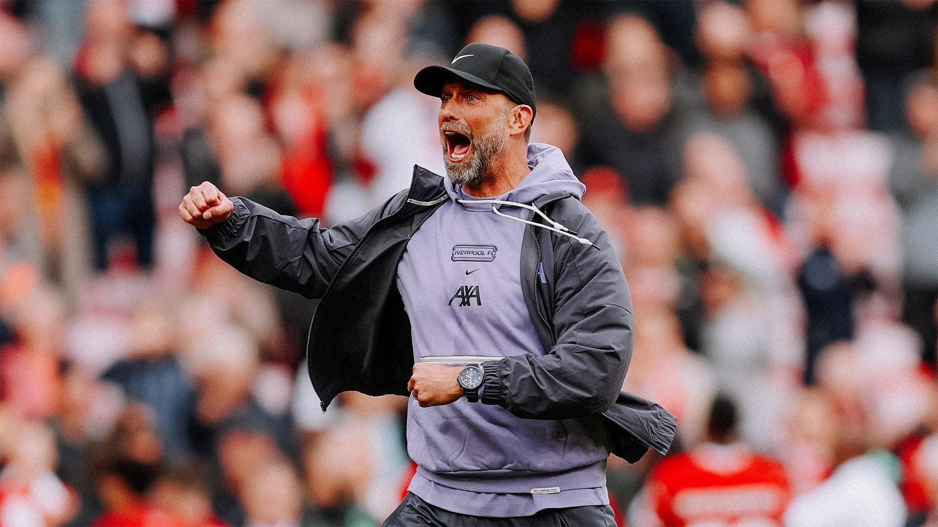 Liverpool's previous manager, Jürgen Klopp, energetically fist-pumping the crowd.