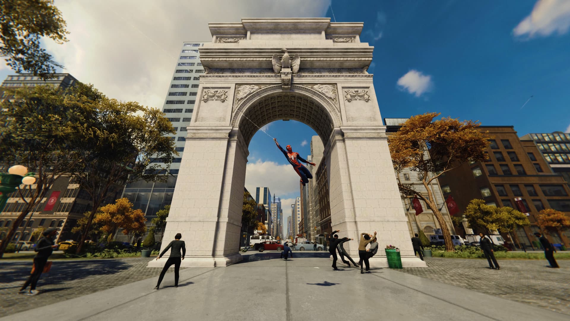 A screenshot from the PS4 game Spider-Man showing the hero swinging through New York City.