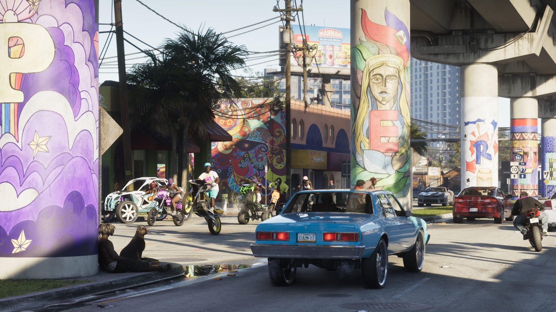 A screenshot from GTA VI showing cars and bikes underneath a highway.