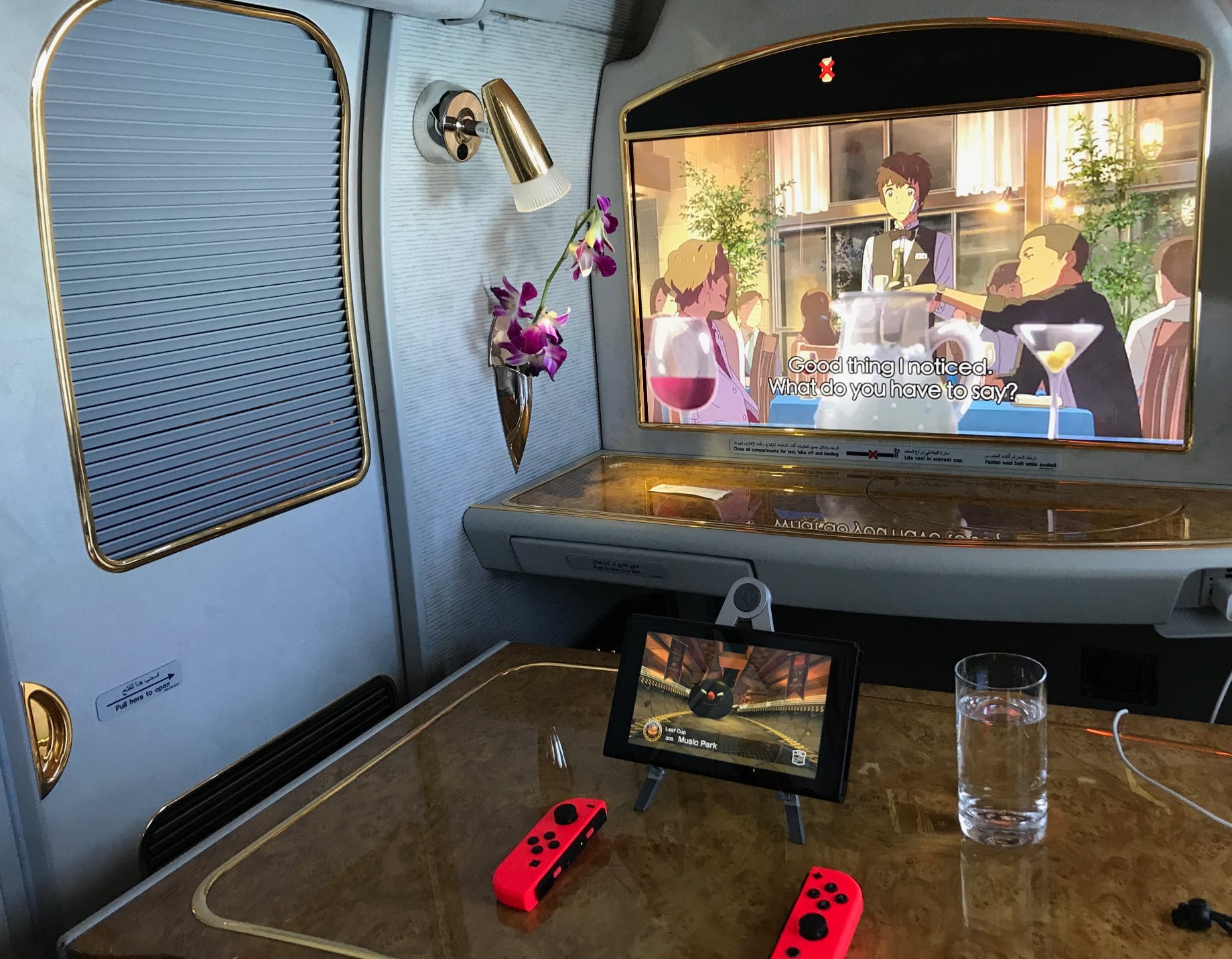 Emirates First Class Suite, with a Nintendo Switch set up on the table.