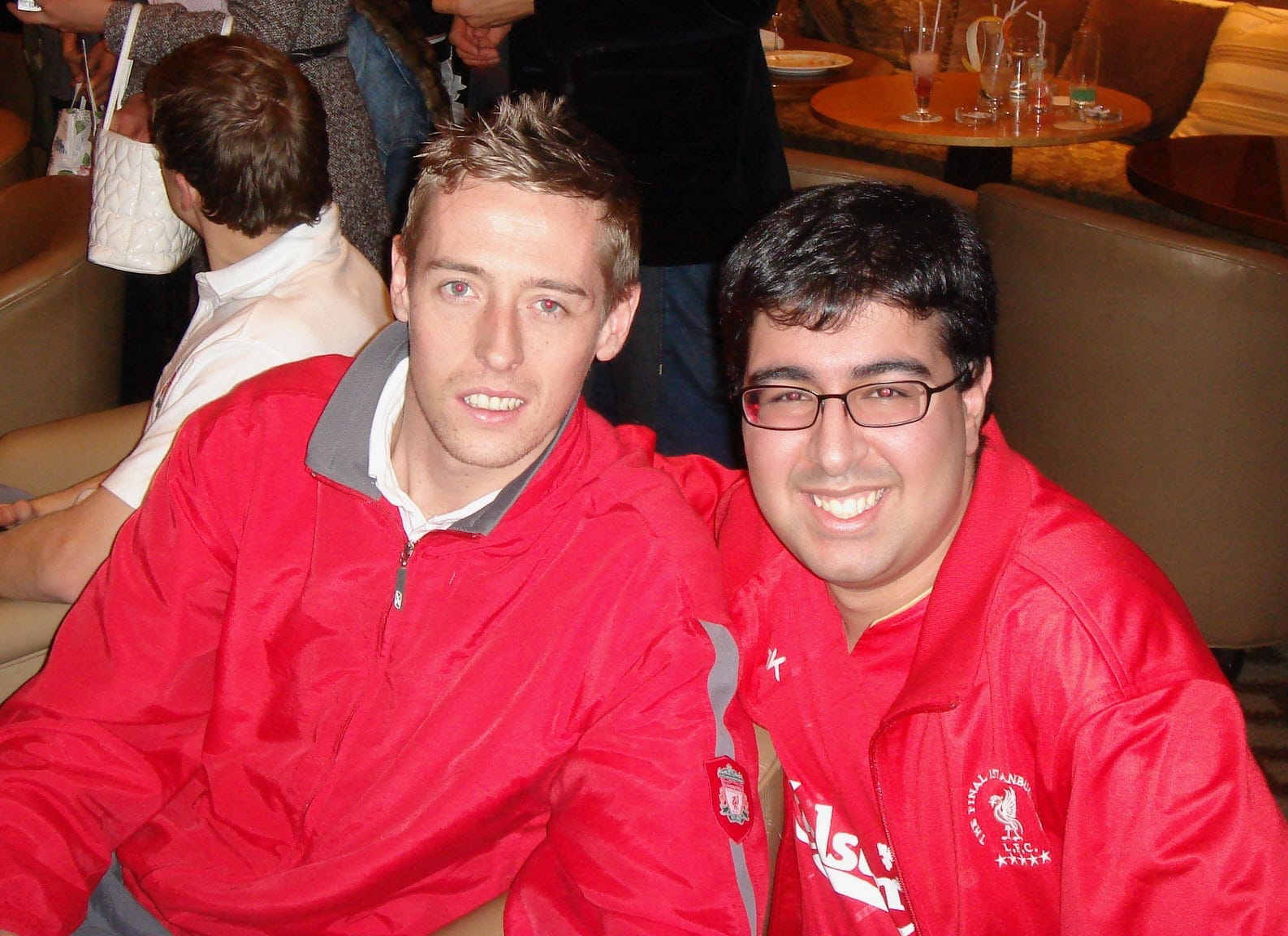 Peter Crouch posing for a photo with Ravi.