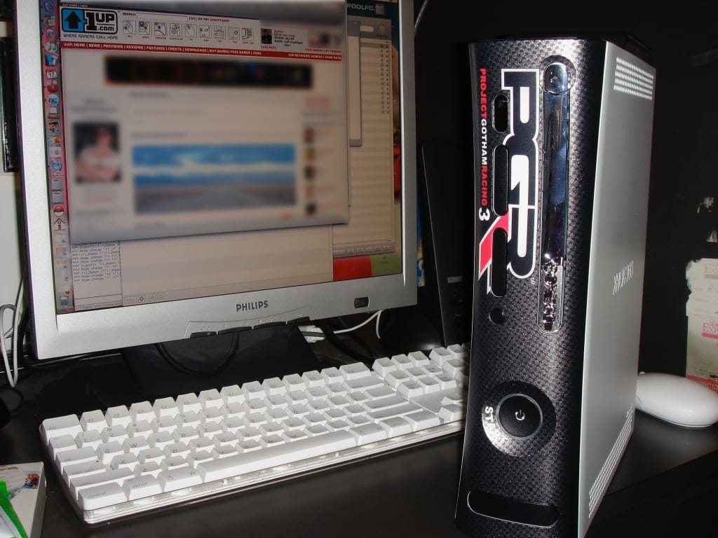 An Xbox 360 console with a PGR3 branded faceplate.
