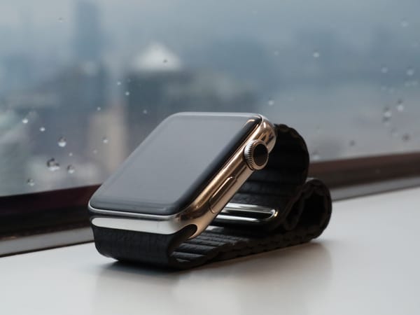 A photo of the original Apple Watch on a windowsill