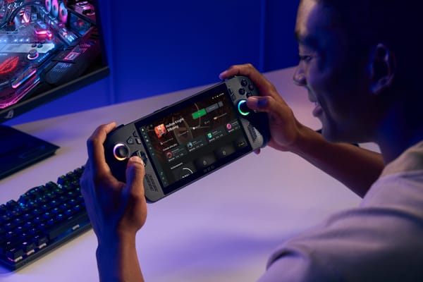 A man holds the new ROG Xbox Ally X PC gaming handheld.